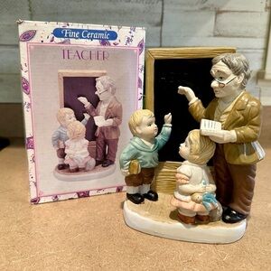 VINTAGE,CERAMIC TEACHER FIGURINE WITH KIDS AT CHALKBOARD. IN VERY GOOD CONDITION